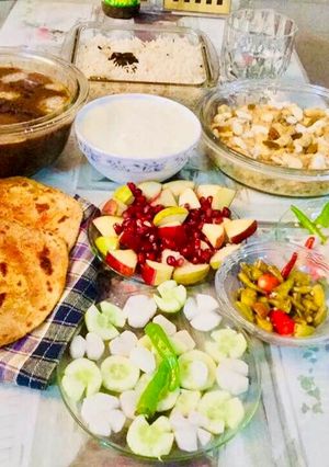 A picture of Dal Maharani,Mughlai Shahi Paneer,mirchi parathas.