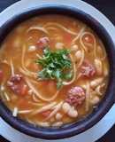 Porotos con riendas y longaniza
