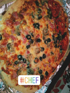 Una foto de Masa de pizza gordita y una receta de relleno