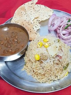 A picture of Black chana with rice.