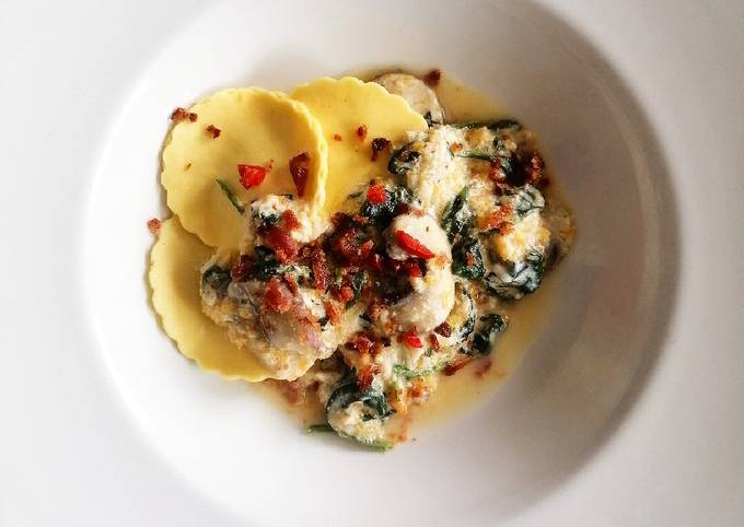 Pumpkin ravioli with a spinach sauce