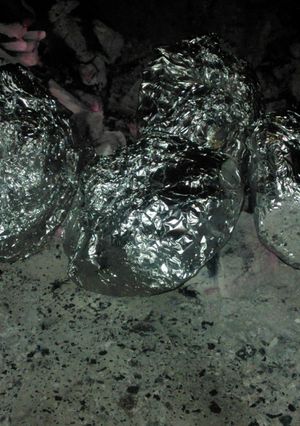 Una foto de Papas y batatas a las brasas