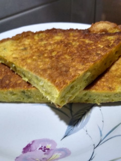 Una foto de Tortilla con Tallos de Brócoli