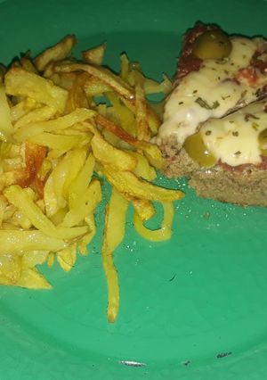 Una foto de Pizza de carne