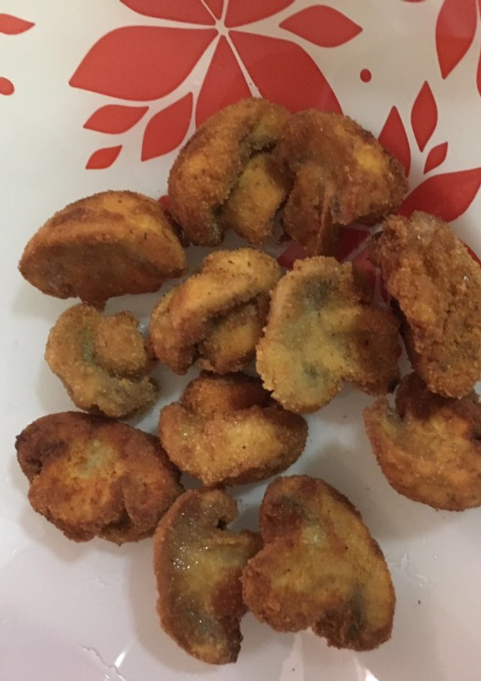 Una foto de Champiñones empanados