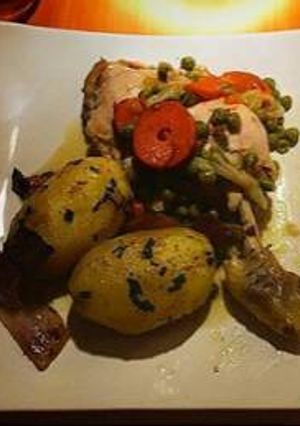Una foto de Pollo Arvejado