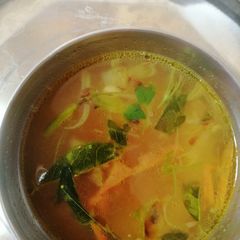 Tomato tamarind rasam A picture of Tomato tamarind rasam.