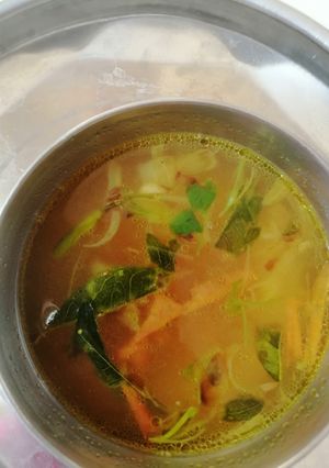 A picture of Tomato tamarind rasam.