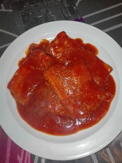 Una foto de Bacalao encebollado con tomate