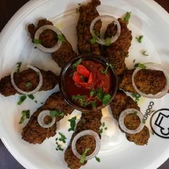 A picture of Tawa seekh kabab.
