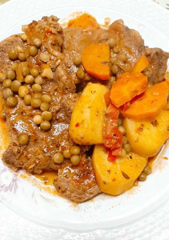 Una foto de Bifes de chorizo a la criolla