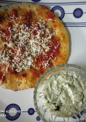 A picture of Schezwan uttapam.