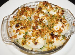 Una foto de Ostiones al broiler con papas a la mantequilla
