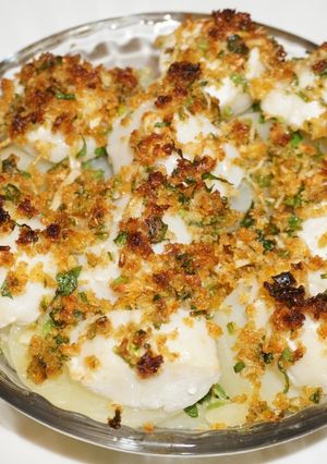 Una foto de Ostiones al broiler con papas a la mantequilla
