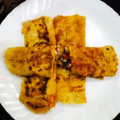 A picture of Stuffed besan chilla.