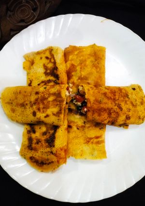A picture of Stuffed besan chilla.