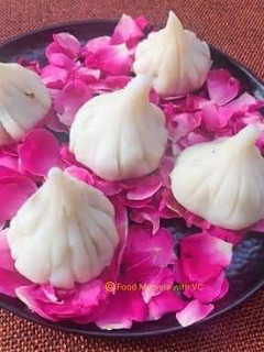 A picture of Ukadiche Modak - Made with Rice Flour, Jaggery and Nuts.