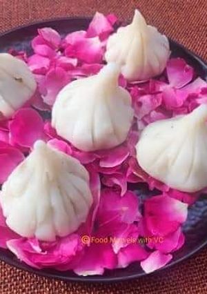 A picture of Ukadiche Modak - Made with Rice Flour, Jaggery and Nuts.