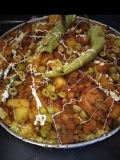 صورة لوصفة طاجين الأرز بلحم الدجاج في الفرن