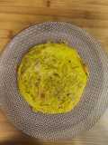 Tortilla de coliflor, zanahoria y patatas paja