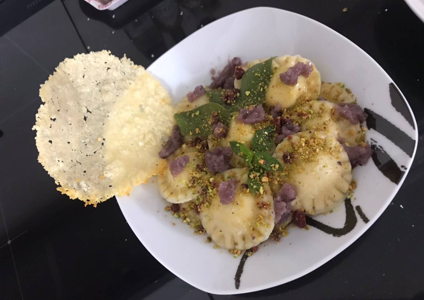 Ravioli with pancakes and prawns.