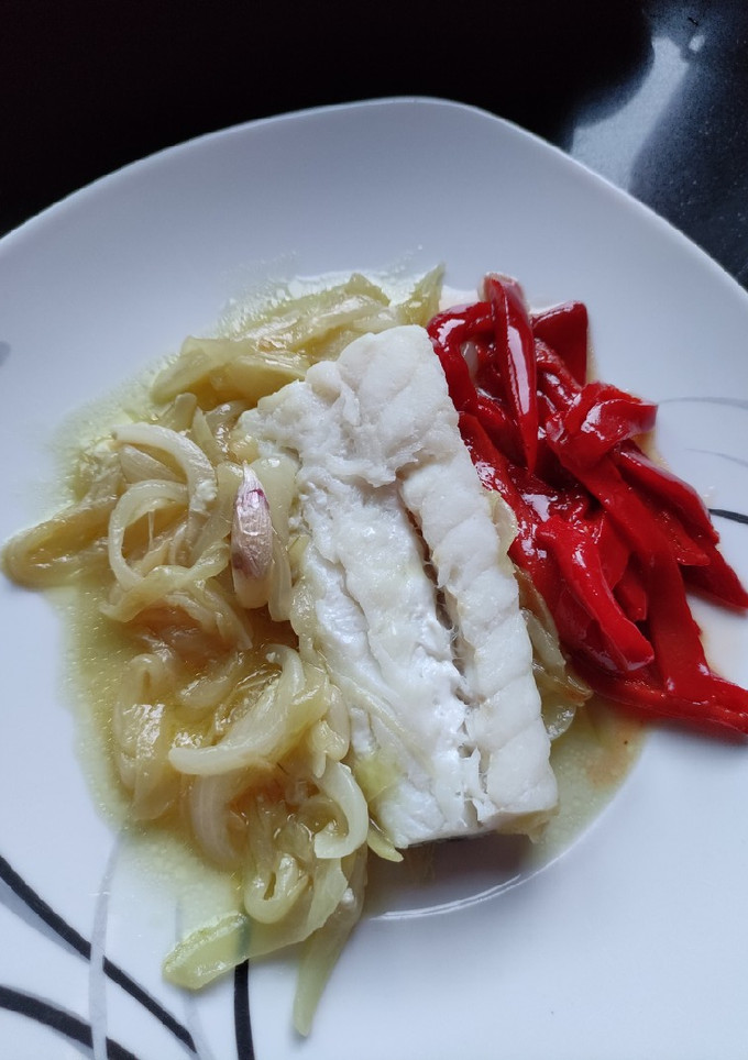 Una foto de Bacalao con pimientos del piquillo