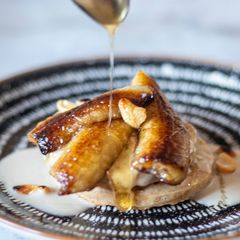 Pancake With Banana in coconut milk and roasted cashew nut A picture of Pancake With Banana in coconut milk and roasted cashew nut.