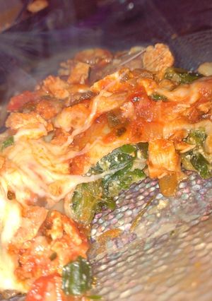 Una foto de Canelones de acelga y ricota con salsa de pollo
