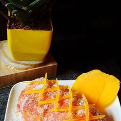Eggless Mango Christmas Special Cake A picture of Eggless Mango Christmas Special Cake.