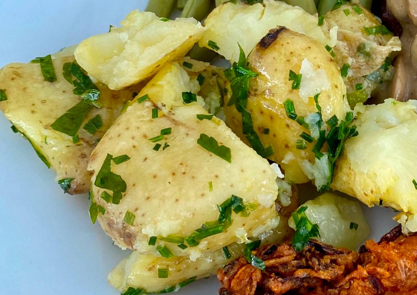 Crushed Jersey Royals with lashings of butter and lots of herbs #mycookbook