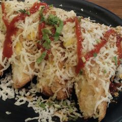 A picture of Cheese corn sandwich.