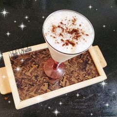 A picture of Banana almonds milkshake.
