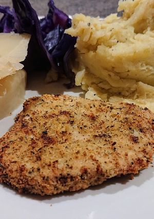 A picture of Herb-Crusted Pork With Apple Mash.