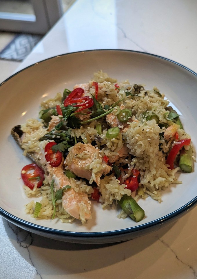 A picture of Green thai salmon and asparagus tray bake.