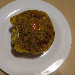 A picture of Stuffed Sweet Dumpling Squash with Sausage.