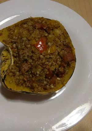 A picture of Stuffed Sweet Dumpling Squash with Sausage.