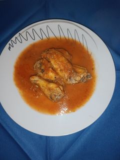 Una foto de Pollo con tomate