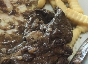 Una foto de Hígado encebollado