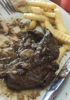 Una foto de Hígado encebollado