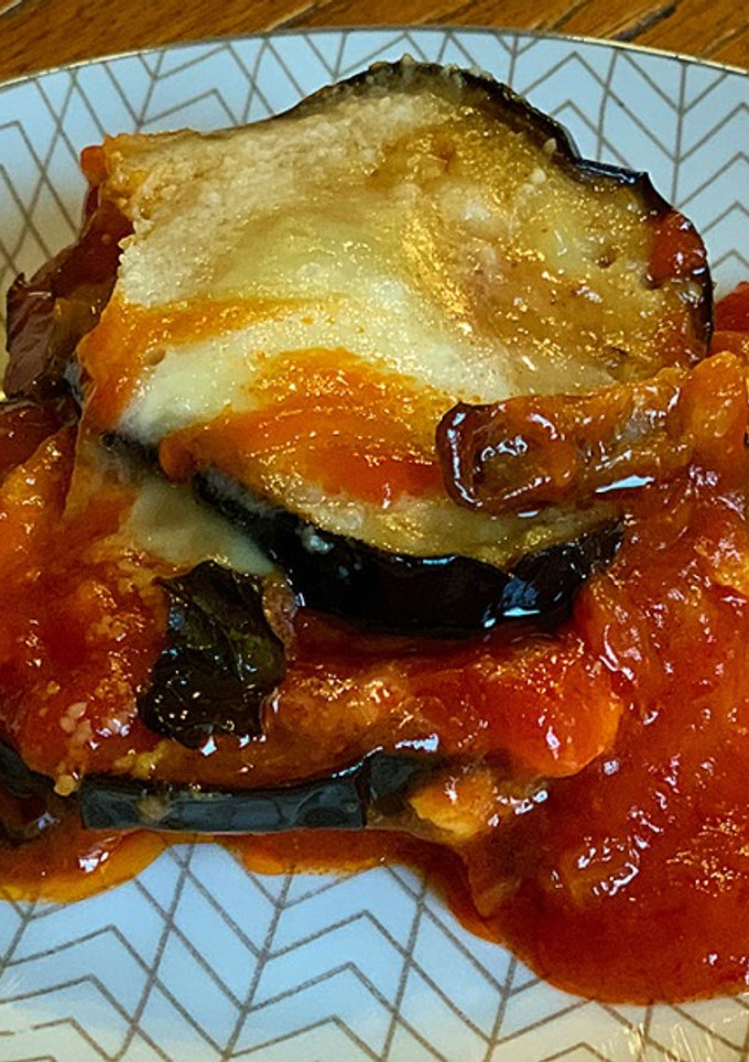 Una foto de Berenjenas a la parmesana