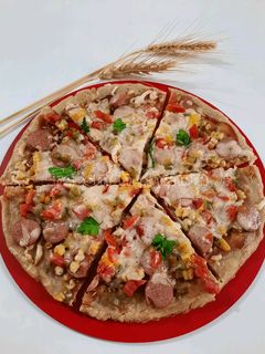 عکسی از دستور نان پیتزا بدون مایه خمیر