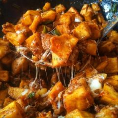 A picture of Cheesy sweet potatoes.
