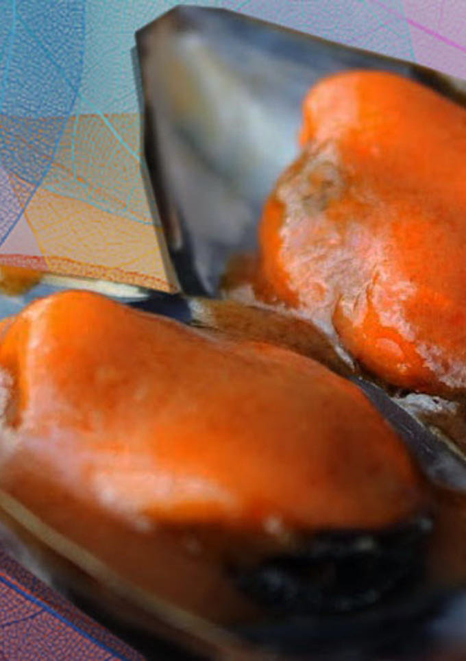 Una foto de Mejillones con tomate picante
