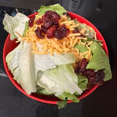 A picture of Cranberry cheese salad with copycat chick-fil-A avocado lime ranch dressing.