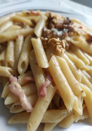 Une photo de Pâtes à la crème de gorgonzola, lardons et noix