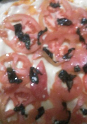 Una foto de Pizza caprese