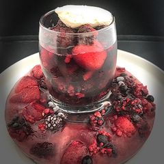 A picture of Mixed Berry Fruit Ice-Ring Made With Non-Alcoholic Sangria Served With Cornish Ice Cream.