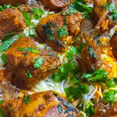 A picture of Smoky Chicken Tikka Biryani.