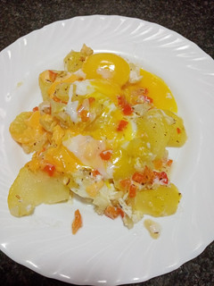 Una foto de Dominó de patatas con huevo