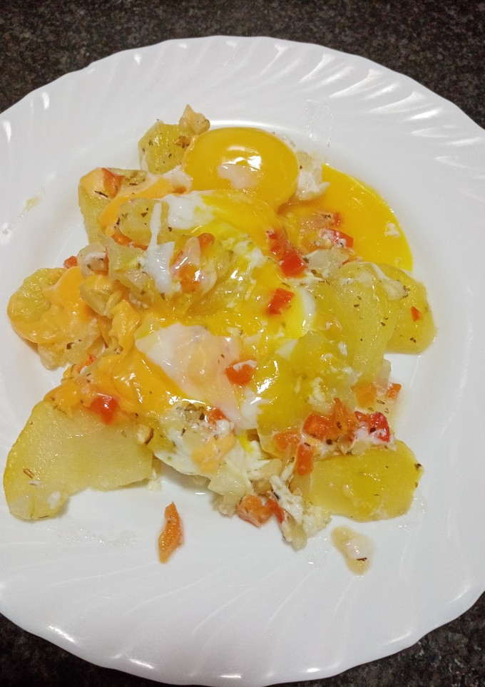 Una foto de Dominó de patatas con huevo